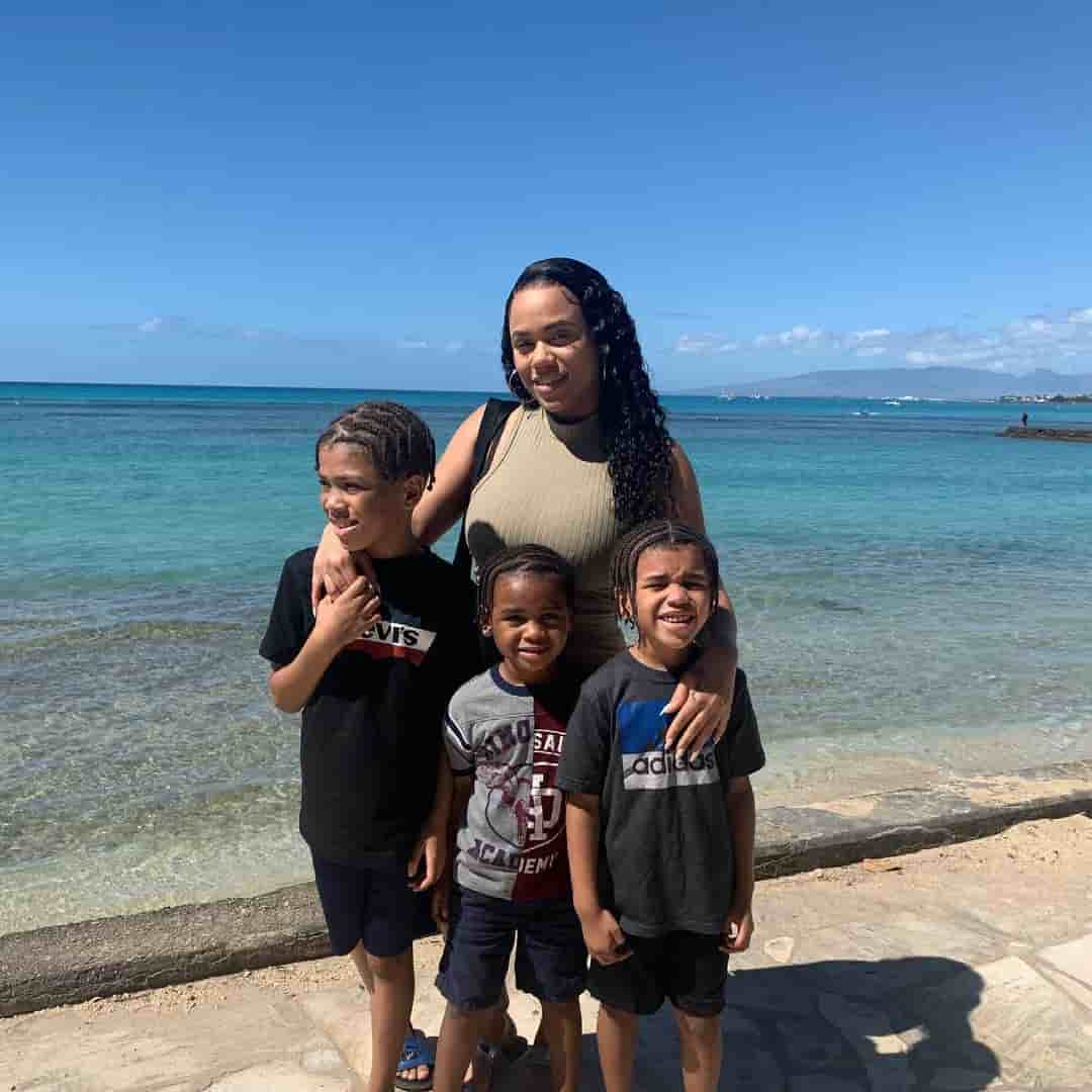 Peanut Nasheed with her three sons (TJ, Mateo, Asir) out on the beach.